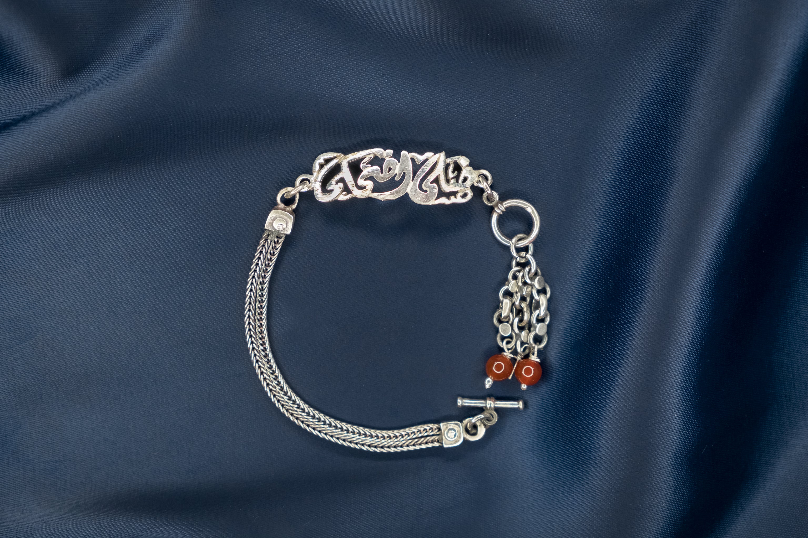 Arabic Silver Bracelet "Keep smiling" with maroon stones