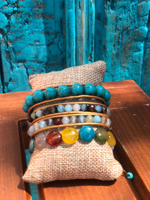 Trio set of Turquoise stones and golden leather