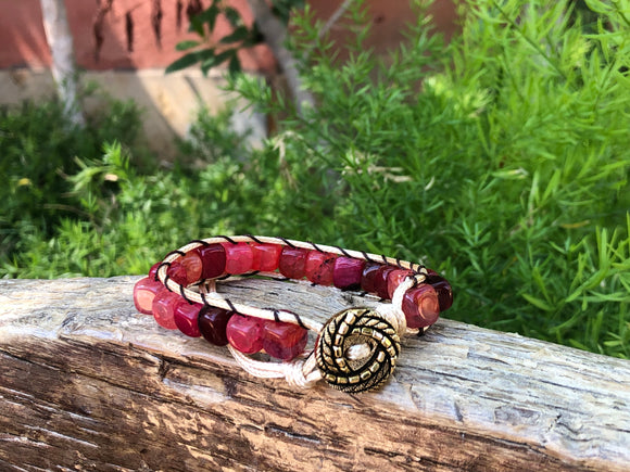 Golden thread bracelet with red agate