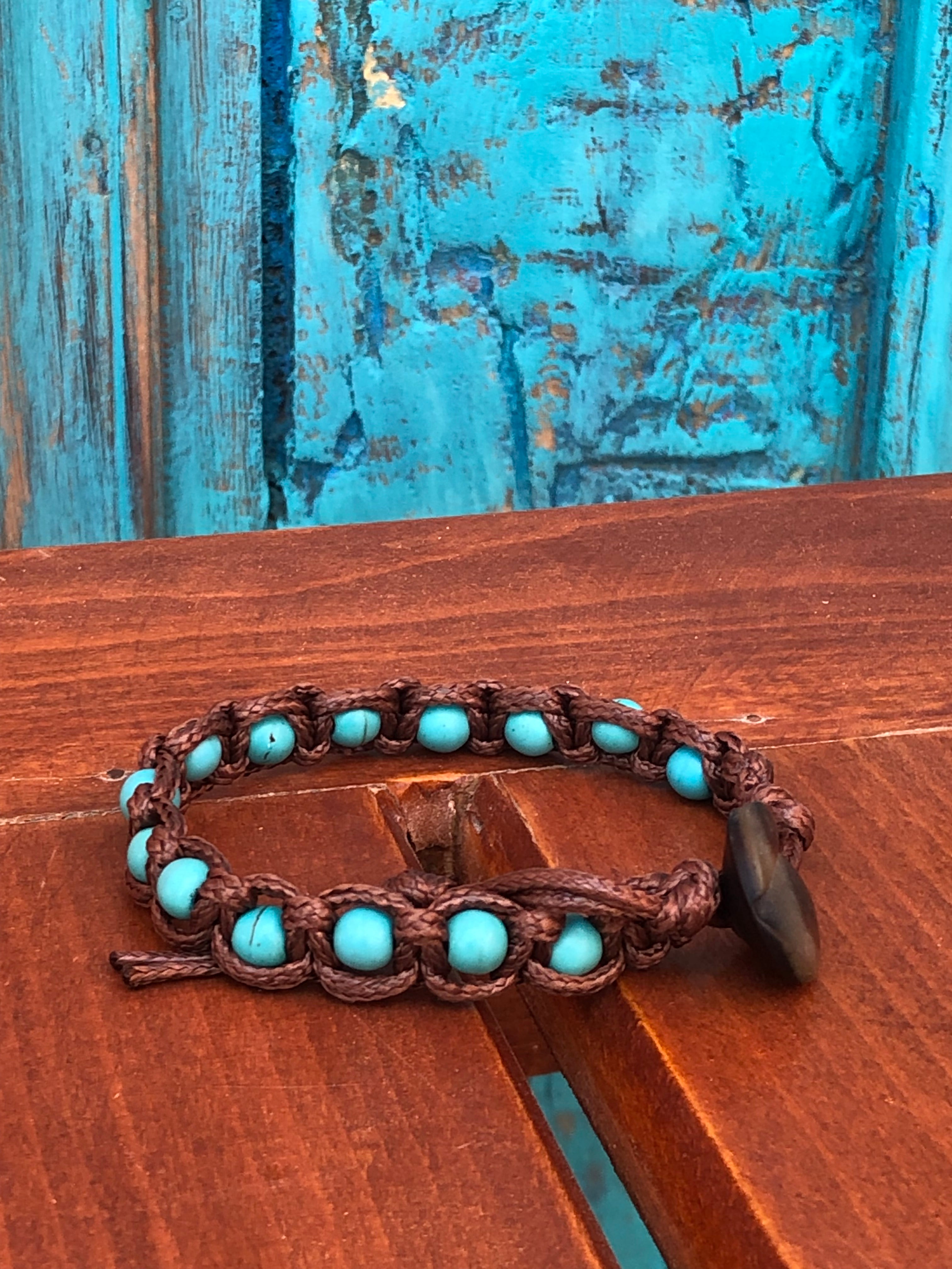 Brown thread bracelet with turquoise stone