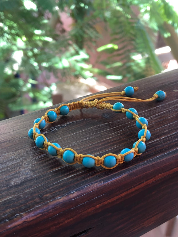 Turquoise train bracelet with macrame clasp