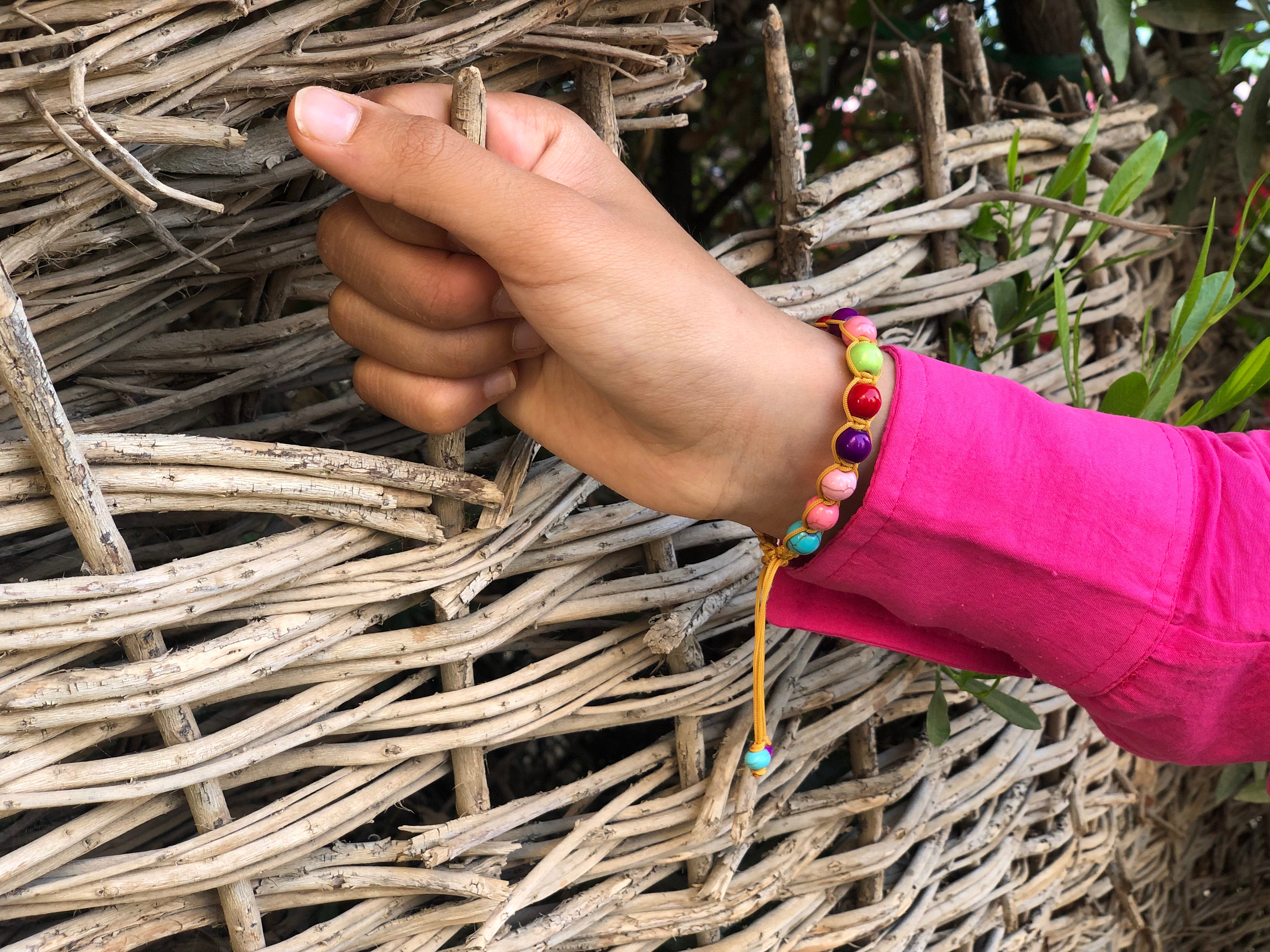 Colorful train bracelet with macrame clasp