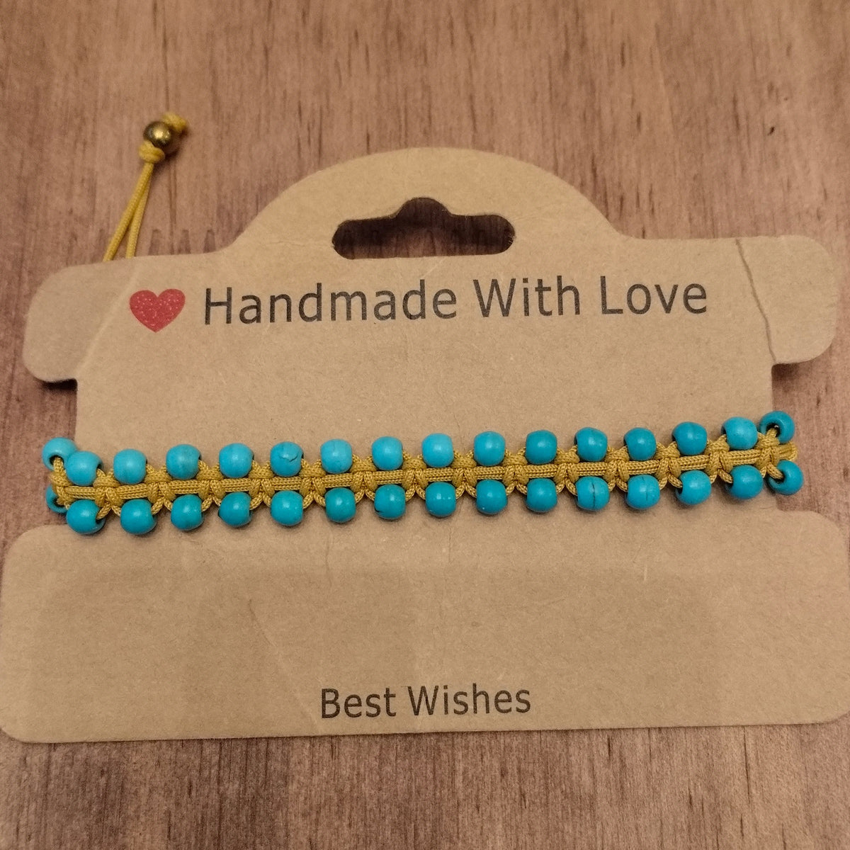 A bracelet of small turquoise beads with a macrame clasp-12039