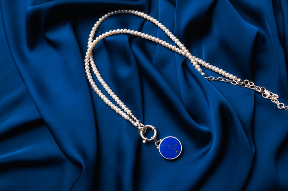 Dark blue circular pendant
