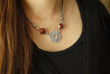 "Every beauty suits you" necklace with maroon stones