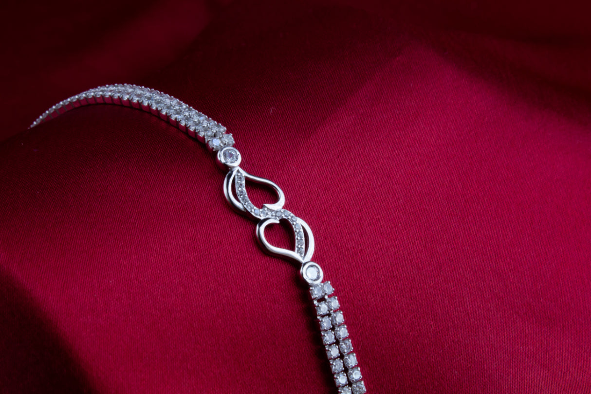 سوار فضي - قلبان مقلوبان