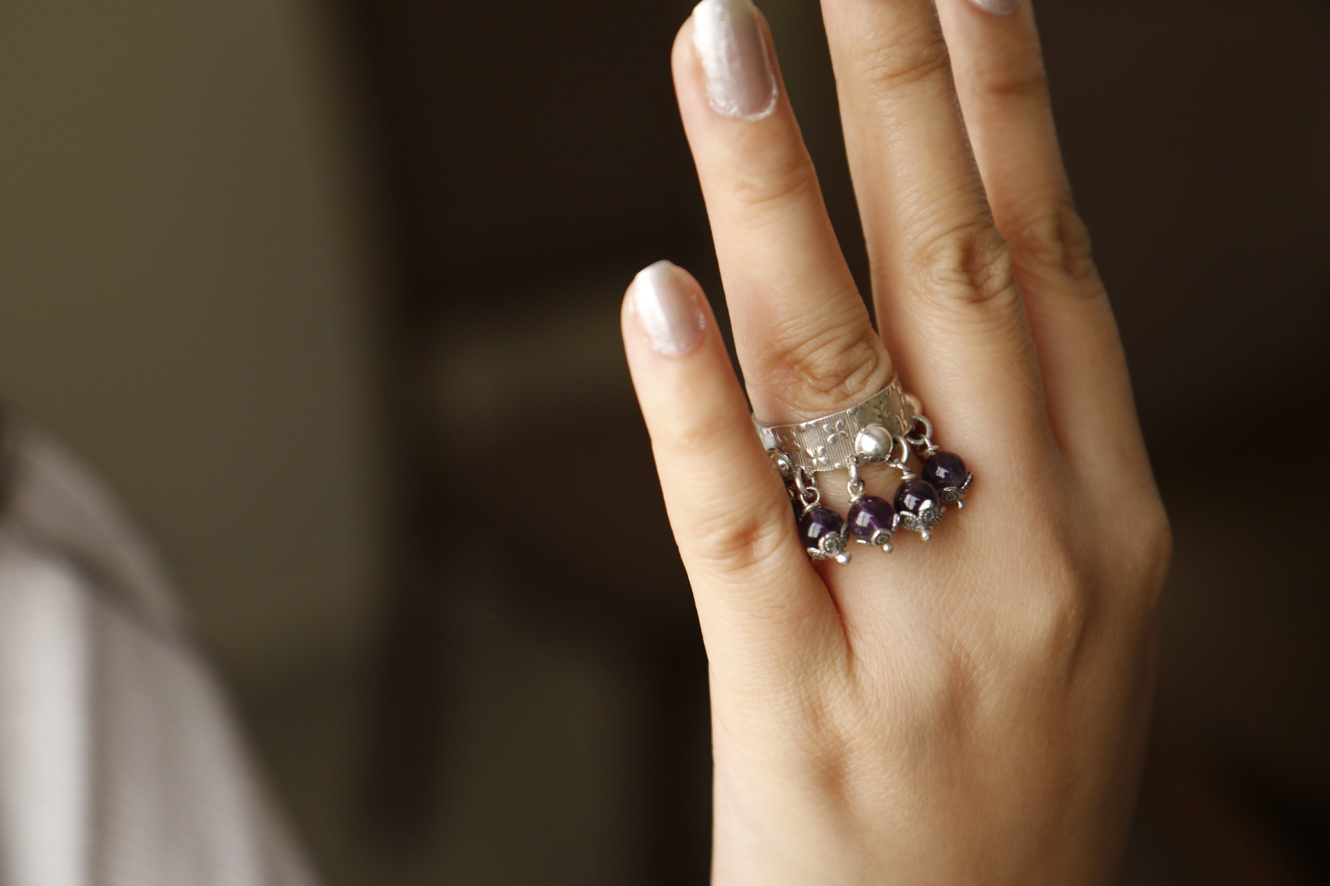 Moving Ring with Violet Stones