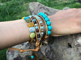 Trio set of Turquoise stones and golden leather