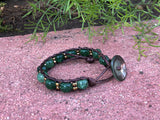 Brown thread bracelet with green agate and golden beads