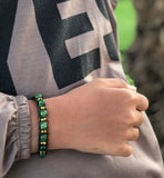 Brown thread bracelet with green agate and golden beads