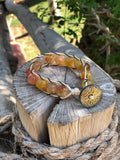 Golden thread bracelet with yellow-orange agate