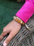 Golden thread bracelet with yellow-orange agate