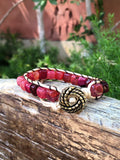 Golden thread bracelet with red agate