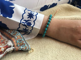 Kashmiri thread bracelet with turquoise stone