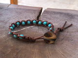 Brown thread bracelet with turquoise stone