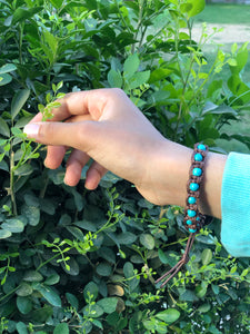 Brown thread bracelet with turquoise stone