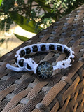 White thread bracelet with black stone