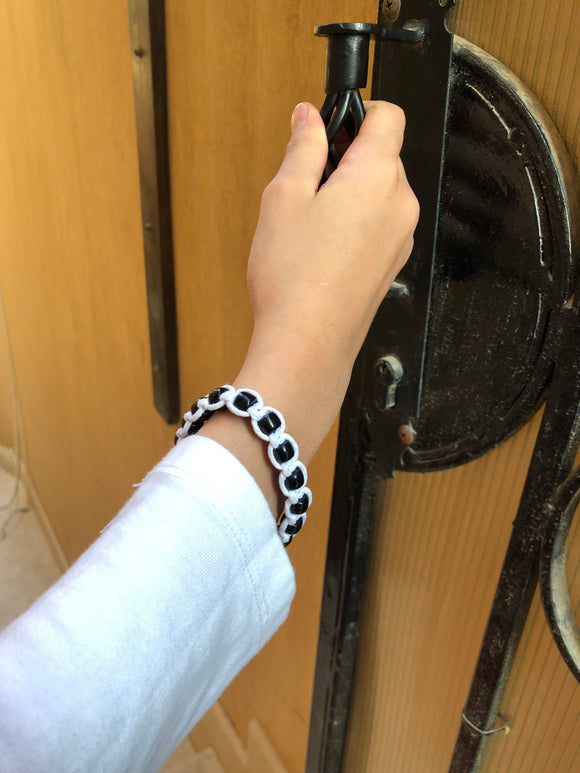 White thread bracelet with black stone