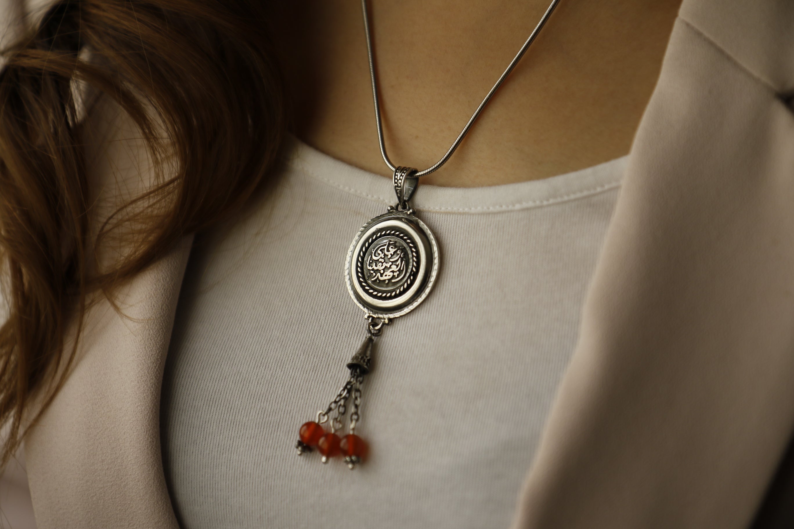 Commitment Pendant With Maroon Stones