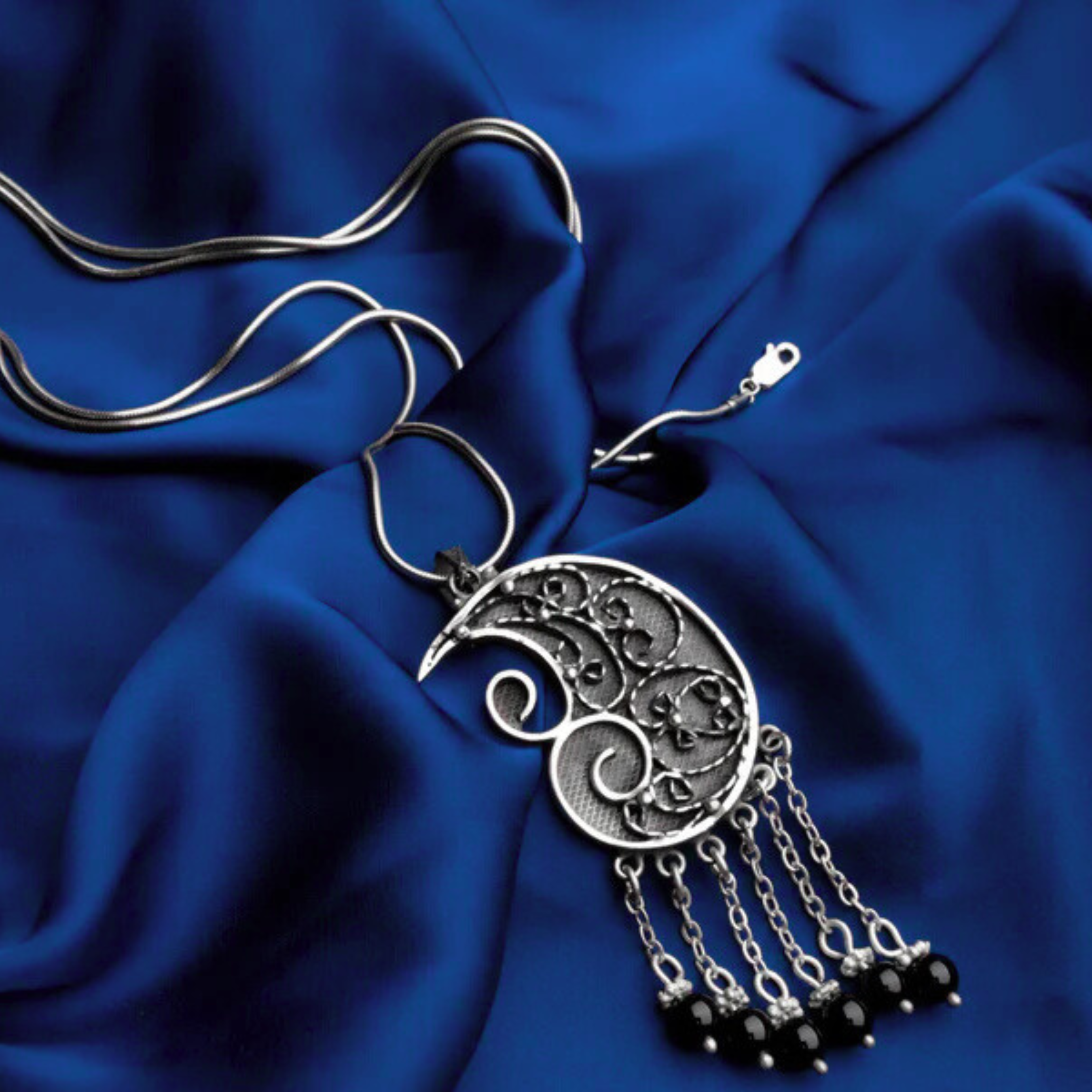 Spiral Pendant With Black Stones