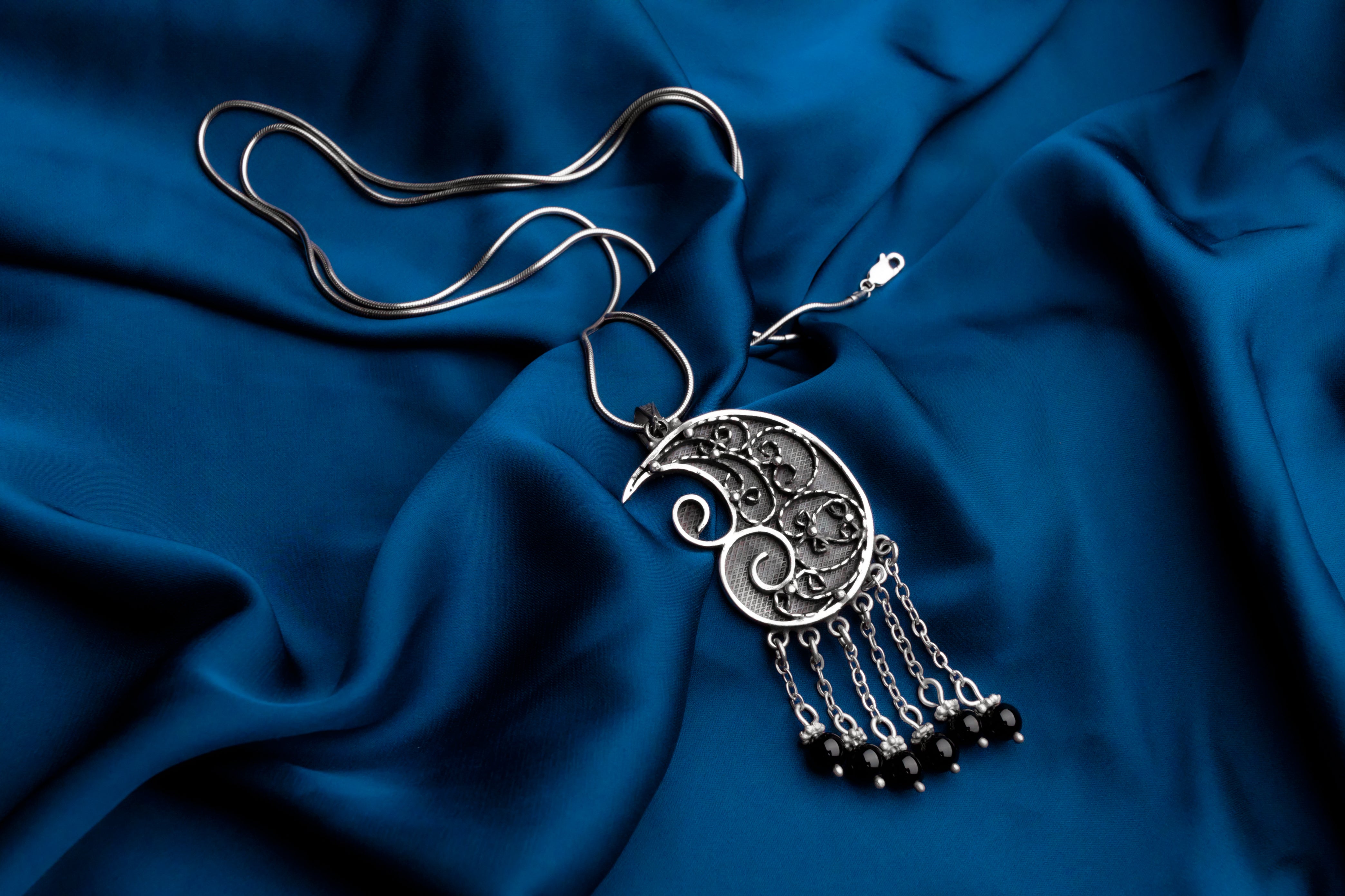 Spiral Pendant With Black Stones