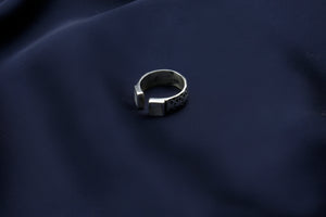 Simple ring with white stone