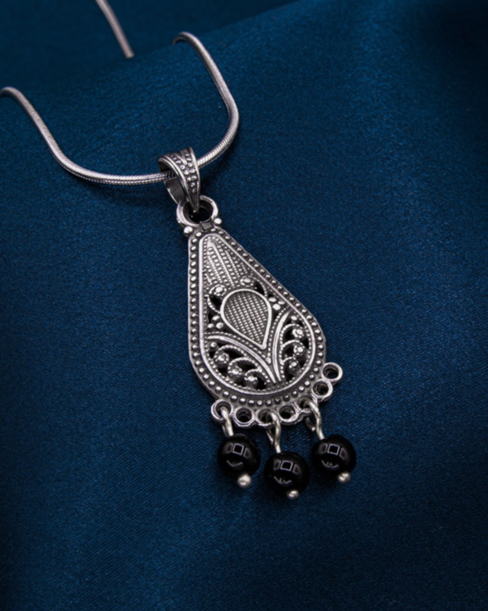 Oriental Silver Pendant- Drop With Dangling Black Stones