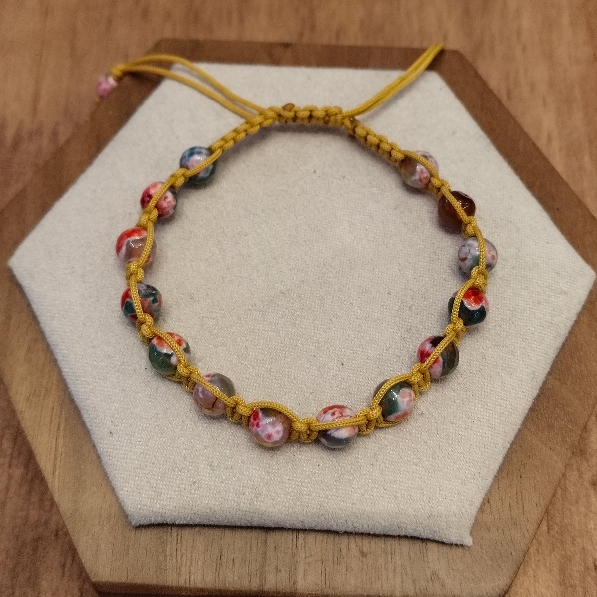 Havana color thread bracelet with green and orange Agate in macrame clasp 12061