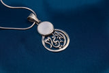 Oriental pendent made of silver with Arabic calligraphy and coloured stone