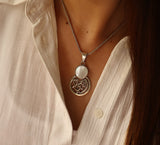 Oriental pendent made of silver with Arabic calligraphy and coloured stone