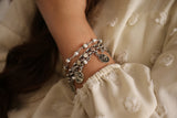 Silver bracelet dangling words with pearls