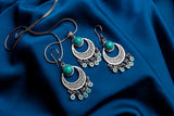 Earring of hope with green stones